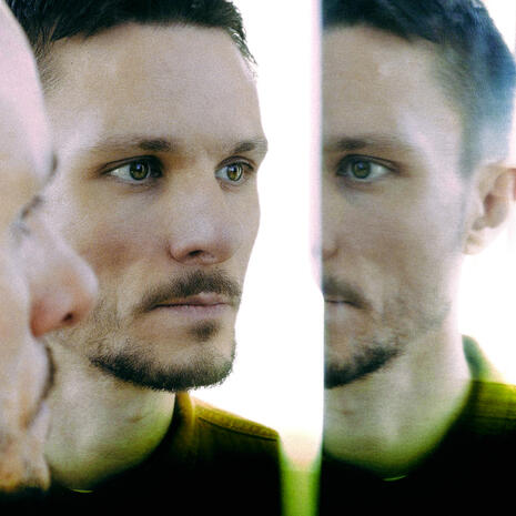 headshot of rhubiqs the music producer & composer